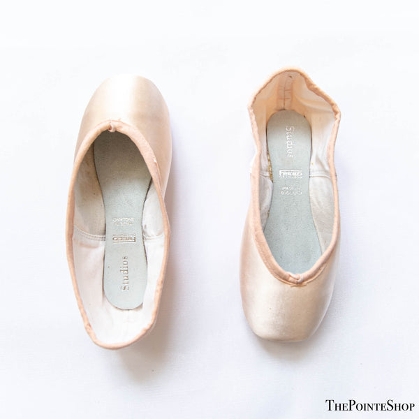 front and back of freed studio pink satin ballet pointe shoe