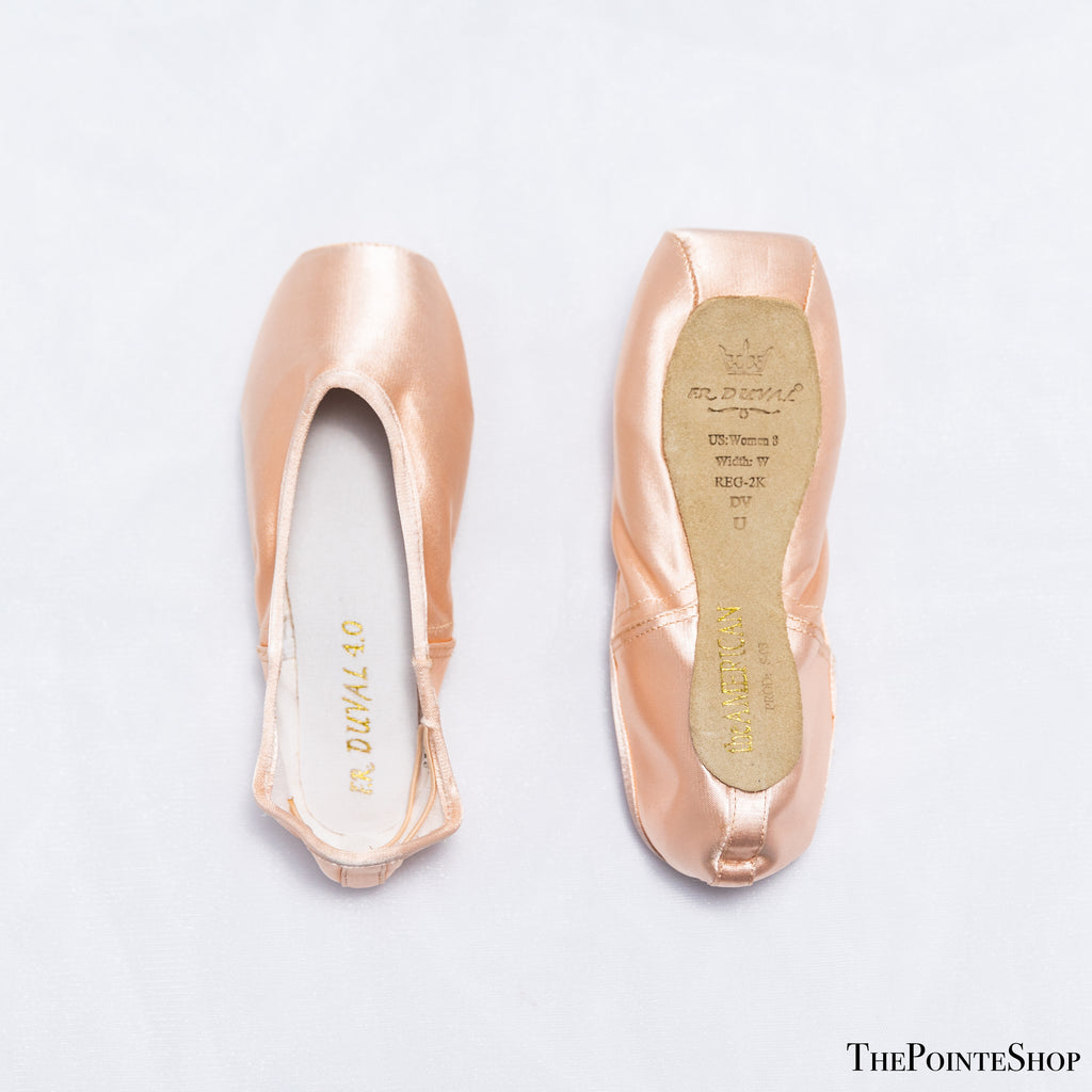 front and back of duval american synthetic shank pink satin ballet pointe shoe